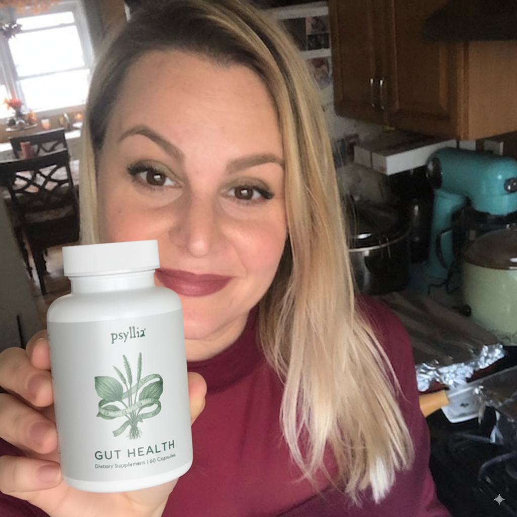 Susan in her kitchen holding her bottle of Psyllia